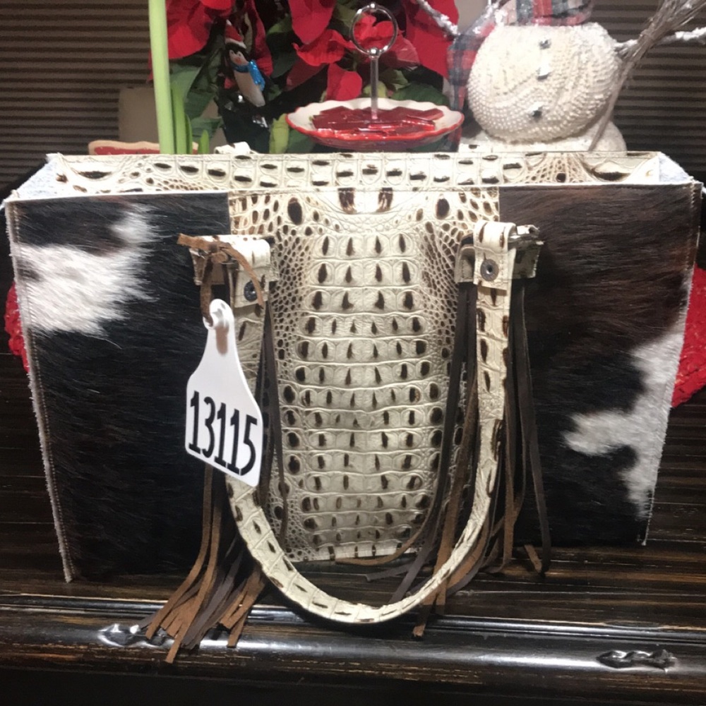 Holy cow couture purse.